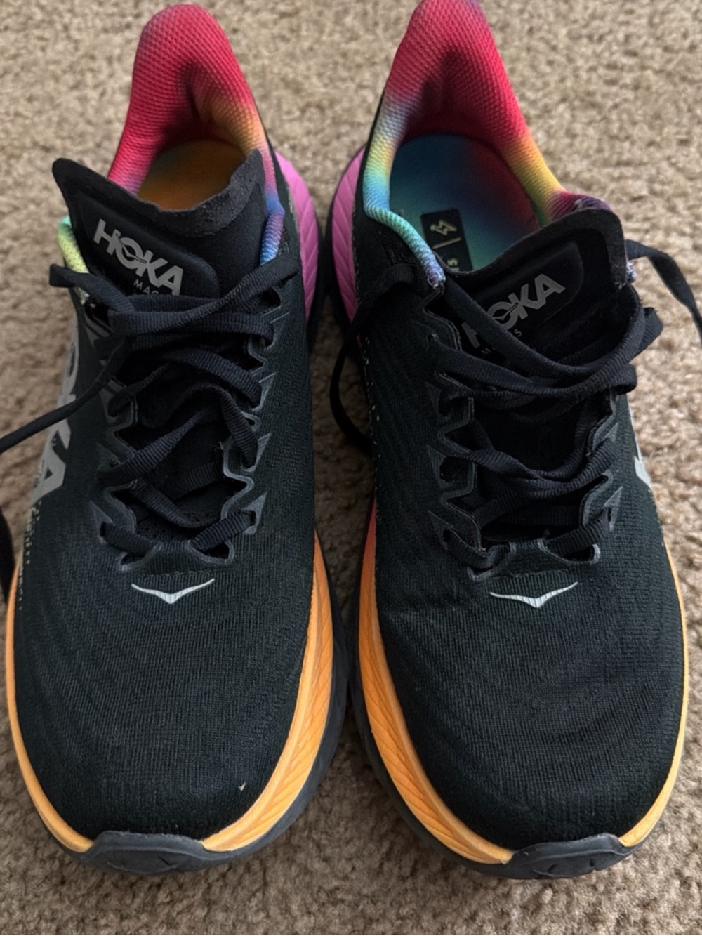 Hoka One One Black Shoes with Orange Midsole and Rainbow Lining